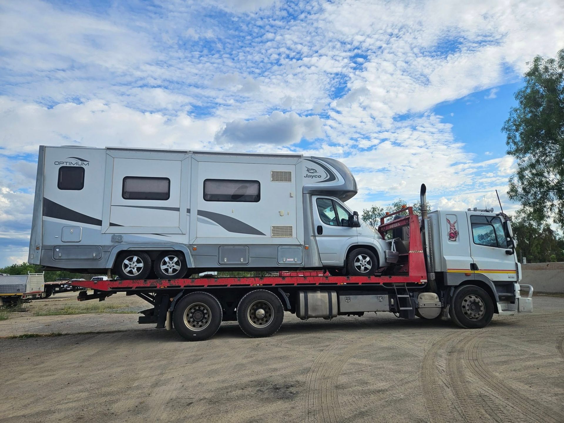 Offset Industries tilt tray truck on a Central Queensland road