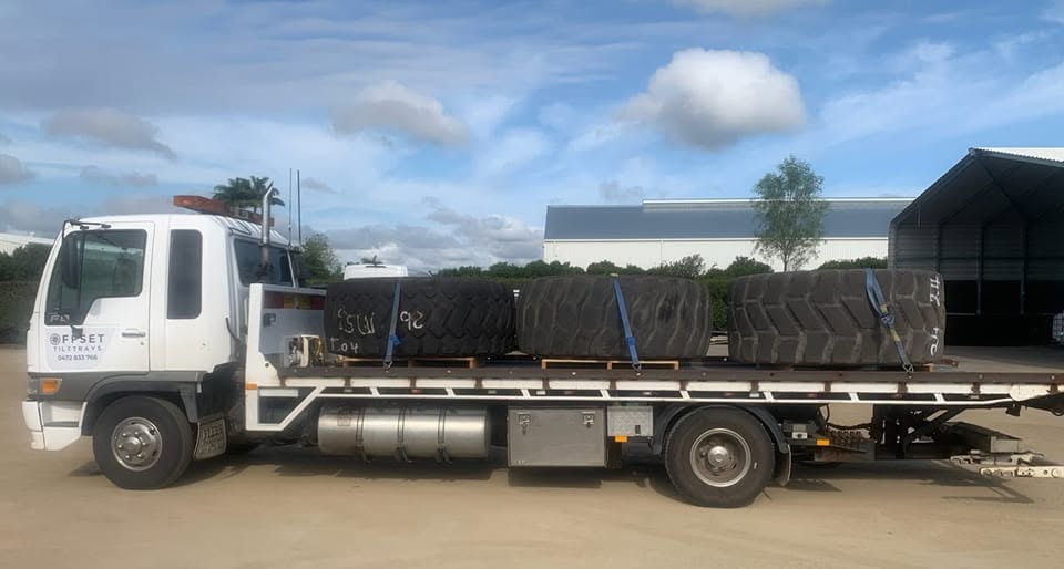 Heavy vehicle undergoing wheel alignment at Offset Industries